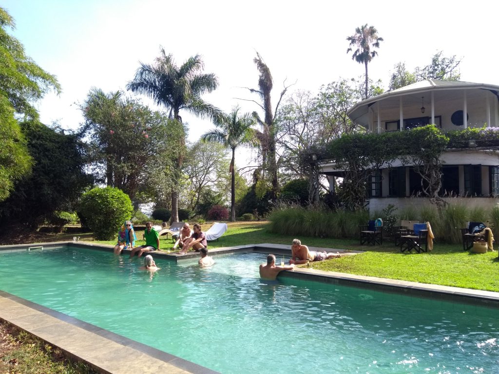 Spiritual Retreat, people enjoying by the swimming pool